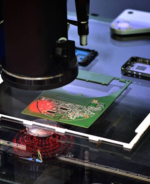 Sensor scanning the circuit board.